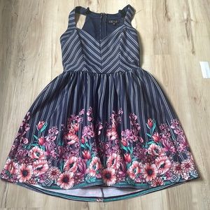Warn Trixxi flower dress in size 11.